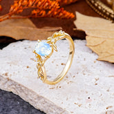 Nature-Inspired Branch-Wrapped 4-Prong Oval Moonstone Engagement  Rings